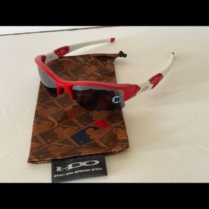 Oakley Red and White Sunglasses with Dark Lenses